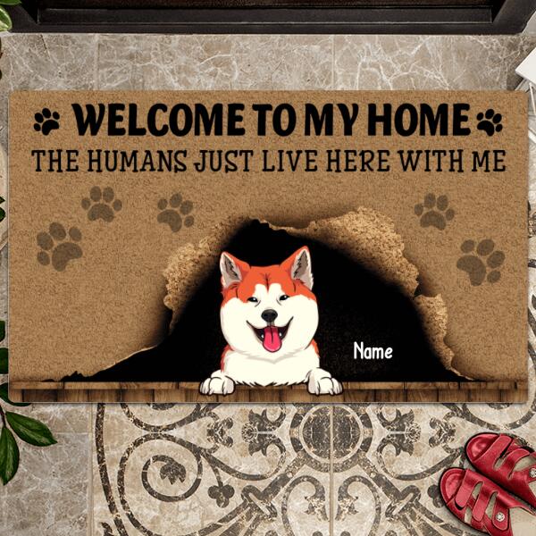 Welcome To Our Home, The Humans Just Live Here With Us, Cute Naughty Dog & Brown Background, Personalized Dog Lovers Doormat