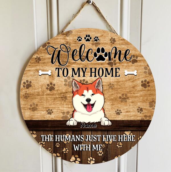 Welcome To Our Home, The Humans Just Live Here With Us, Dog Pawprints Background, Personalized Dog Lovers Door Sign