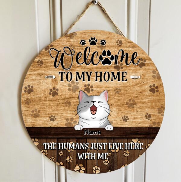 Welcome To Our Home, The Humans Just Live Here With Us, Cat Pawprints Background, Personalized Cat Lovers Door Sign