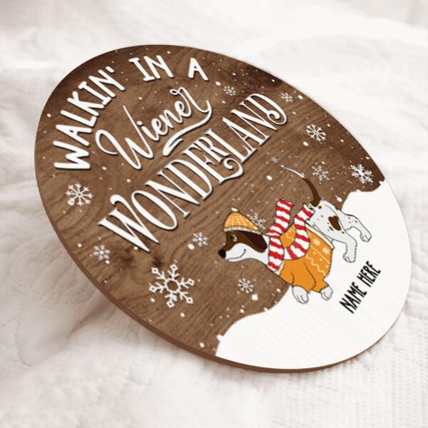 Walkin' In A Wiener Wonderland - Dachshund In Snow - Dark Pale Wooden - Personalized Dog Christmas Door Sign