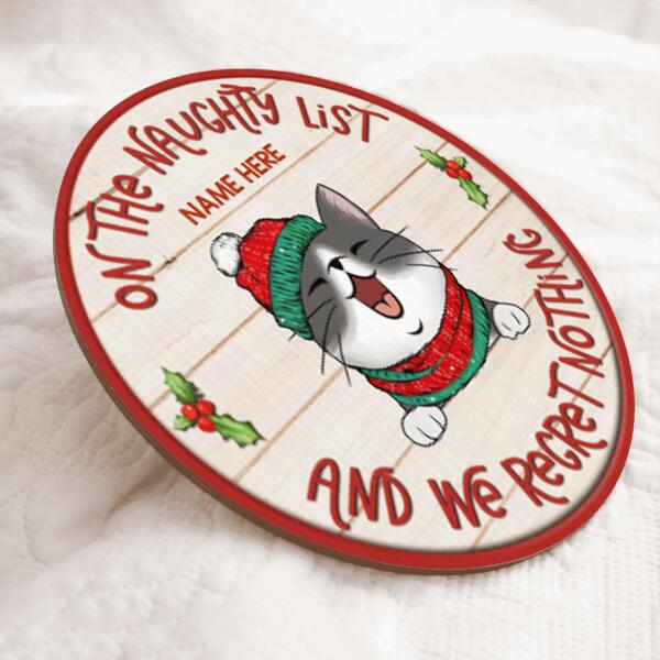 On The Naughty List And We Regret Nothing - Pale Wooden Red Around - Personalized Cat Christmas Door Sign