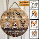 Welcome To Our Home, The Humans Just Live Here With Us, Dog Pawprints Background, Personalized Dog Lovers Door Sign