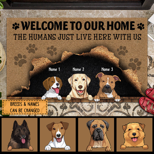 Welcome To Our Home, The Humans Just Live Here With Us, Cute Naughty Dog & Brown Background, Personalized Dog Lovers Doormat